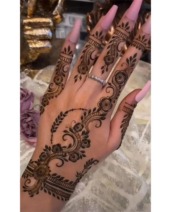 Detailed Symmetry On Grid Back Hand Mehndi Design
